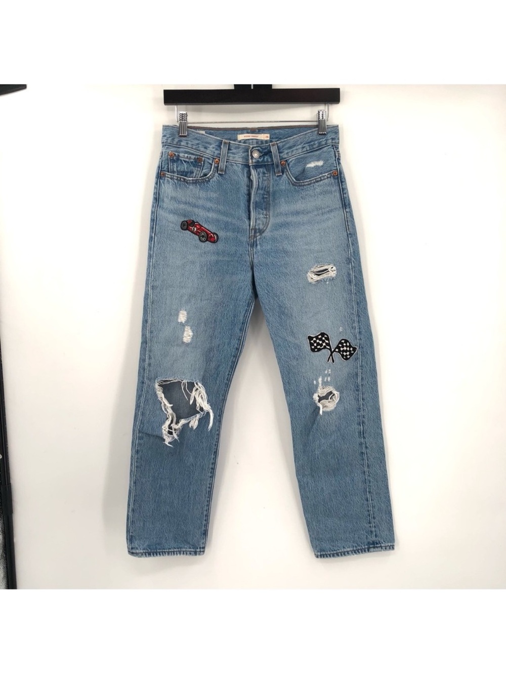 Light Wash Levi Distressed Jeans with Racing Patch